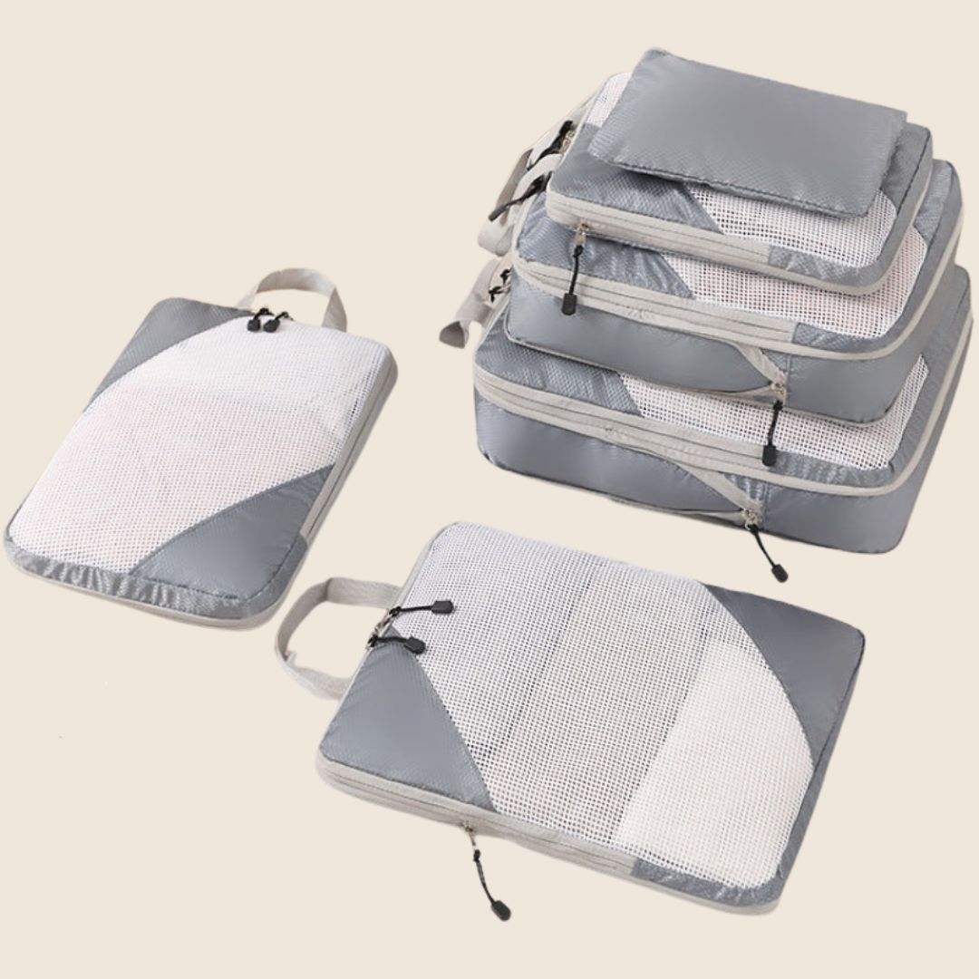 TRAVEL BAG WITH DUAL ZIP COMPRESSION STORAGE